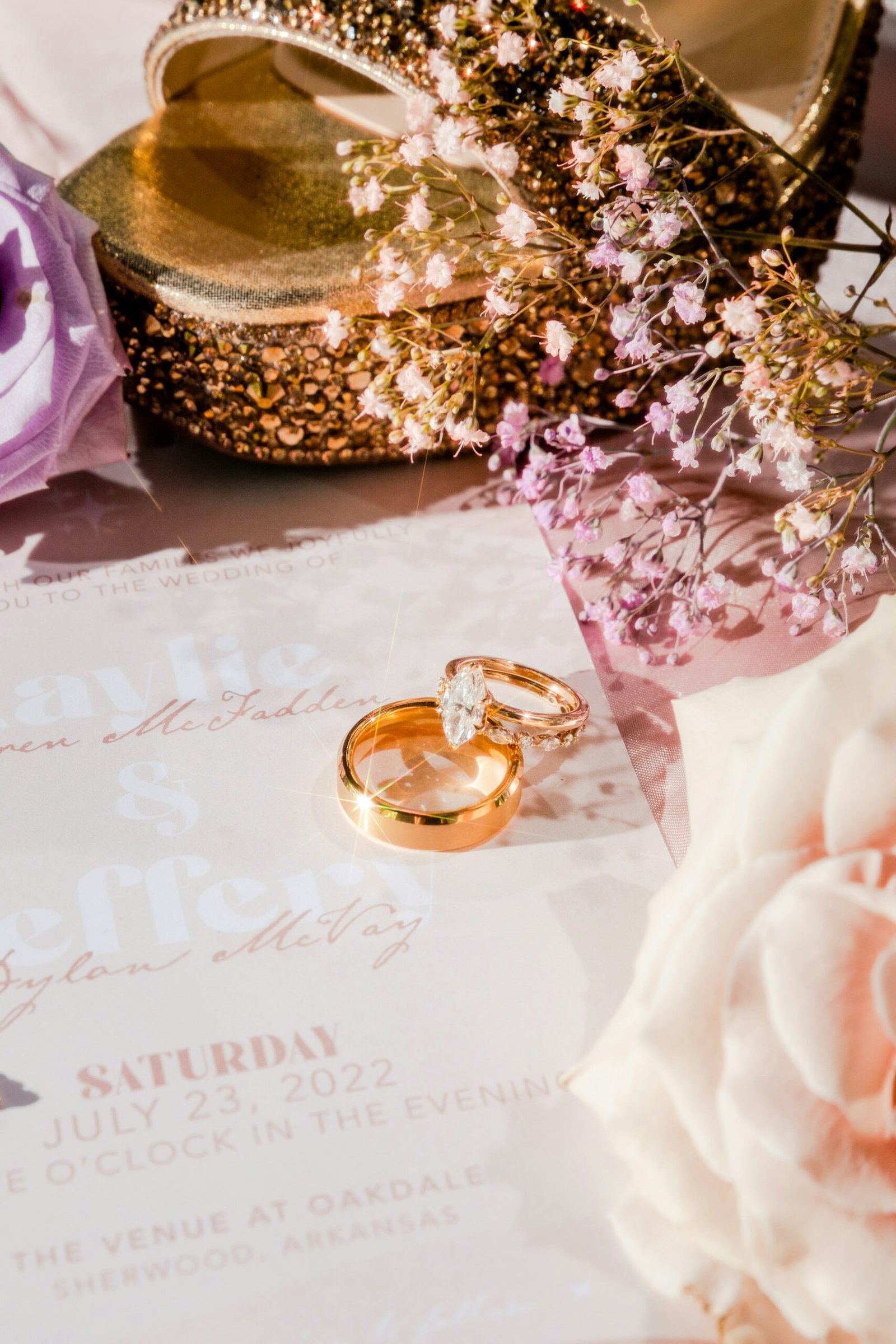 Wedding rings resting on top of a document