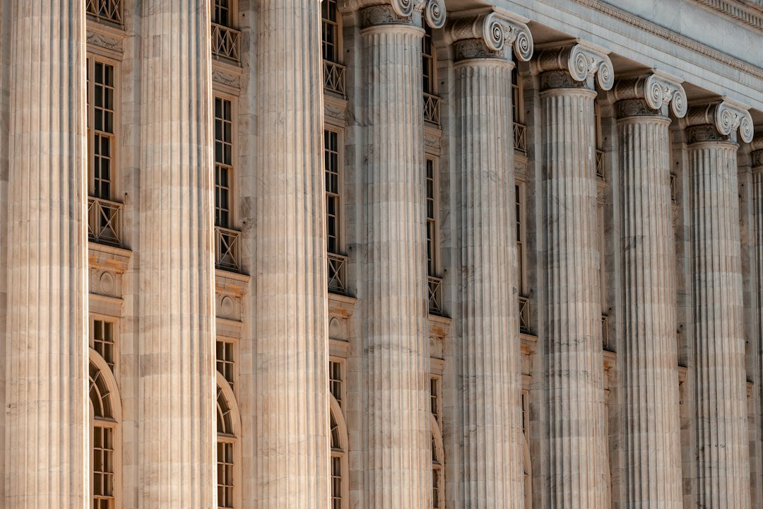 Courthouse building with columns and a clock tower