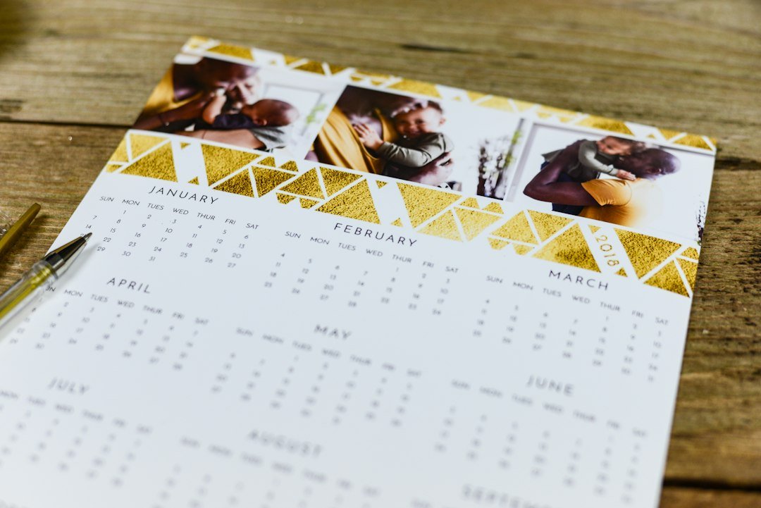 Yearly wall calendar on a wooden table